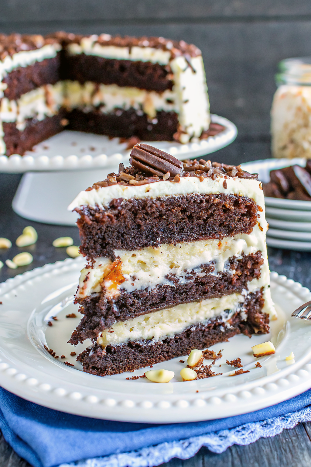 Almond Joy Layer Cake slice on plate showing perfect texture and swirl pattern